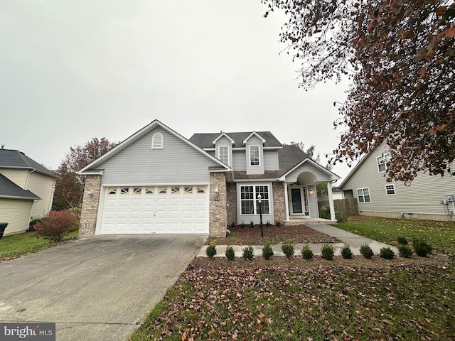 view of front of property with a garage