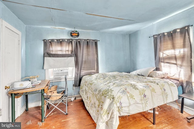 bedroom featuring wood-type flooring