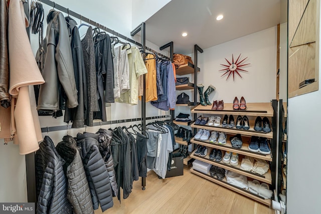 spacious closet featuring light wood-type flooring