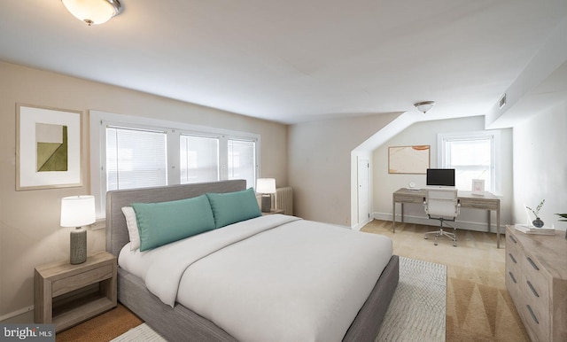 carpeted bedroom featuring radiator heating unit