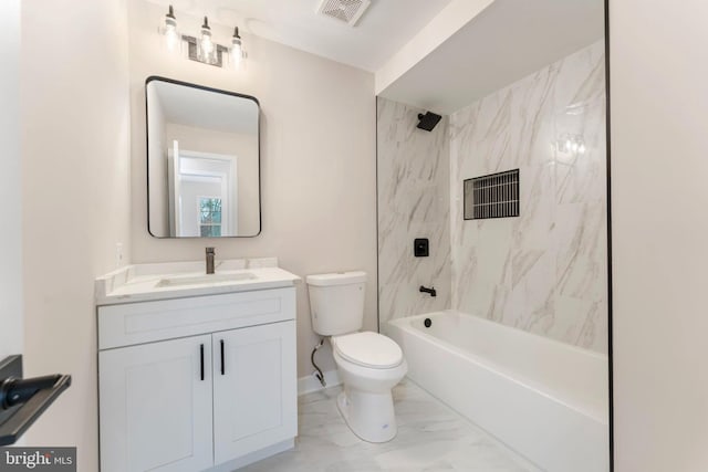 full bathroom with vanity, toilet, and tiled shower / bath