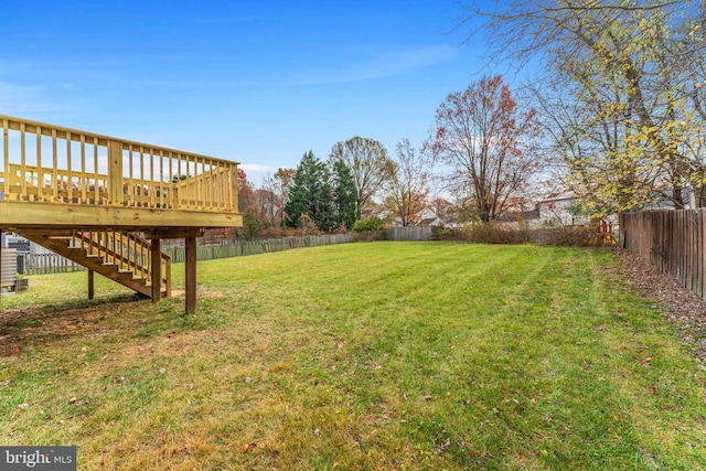 view of yard featuring a deck