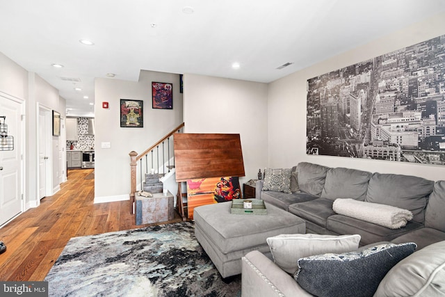 living room with light hardwood / wood-style flooring