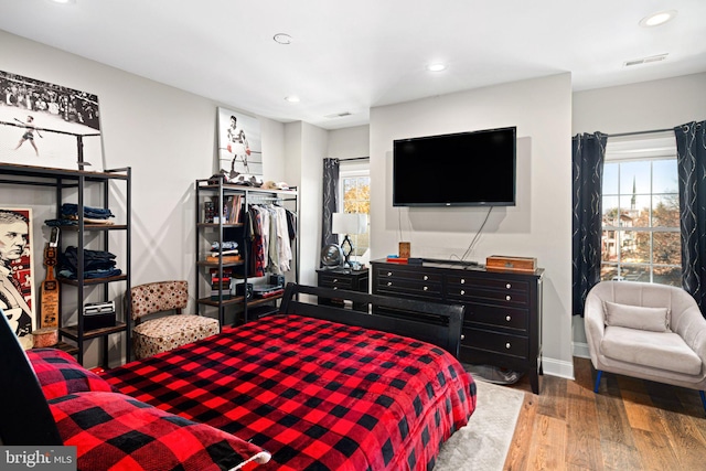 bedroom featuring hardwood / wood-style flooring