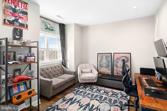 home office with hardwood / wood-style floors