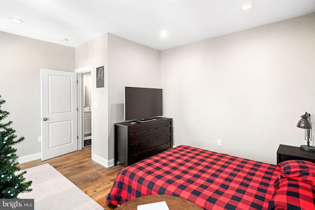 bedroom featuring light hardwood / wood-style floors