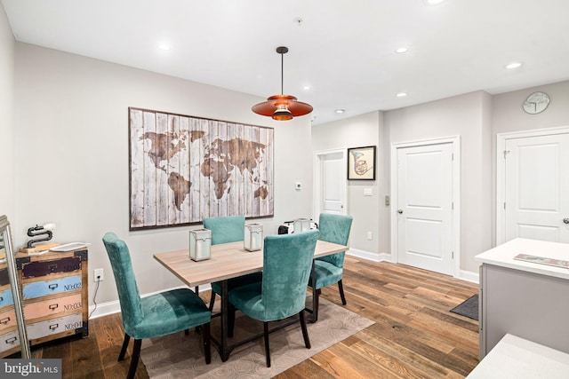 dining space featuring hardwood / wood-style flooring