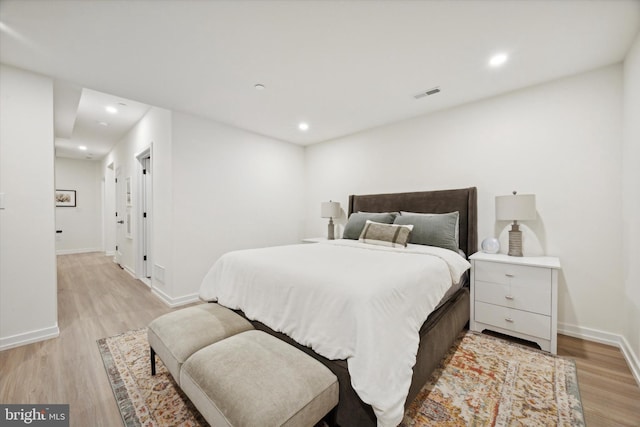 bedroom with light hardwood / wood-style floors