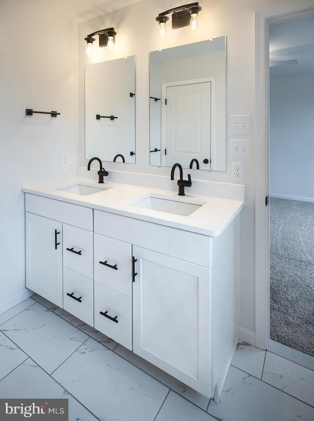 15 Tilghman Trl, Mechanicsburg, PA 17050 - bathroom featuring marble finish flooring, double vanity, and baseboards