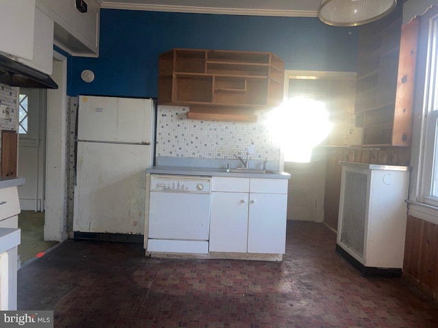 kitchen featuring white cabinets, white appliances, backsplash, and sink