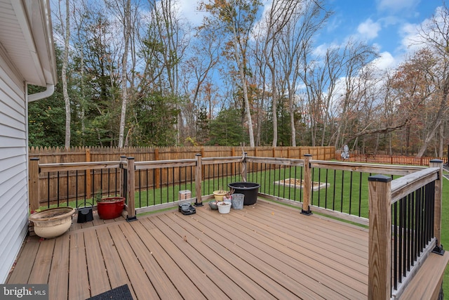 wooden deck with a yard