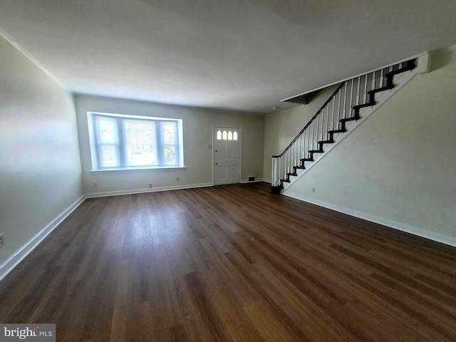 6107 Loretto Ave, Philadelphia, PA 19149 - entryway with stairway, dark wood-style flooring, and baseboards