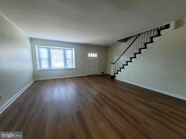 entrance foyer featuring dark hardwood / wood-style flooring