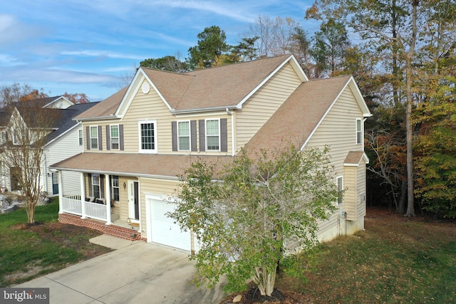 view of front facade featuring a porch and a garage