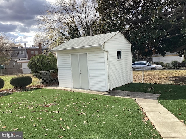 view of outdoor structure featuring a yard