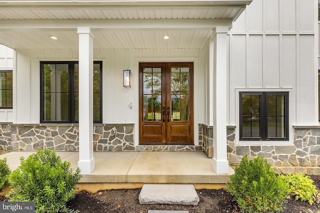 1739 Garnet Mine Rd Lot 2, Garnet Valley, PA 19060 - entrance to property featuring stone siding, board and batten siding, french doors, and a porch
