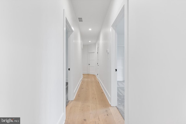 hall featuring light hardwood / wood-style floors