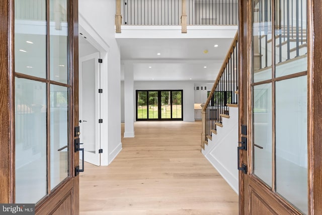 1739 Garnet Mine Rd Lot 2, Garnet Valley, PA 19060 - entryway featuring light wood-style floors, stairway, baseboards, and french doors
