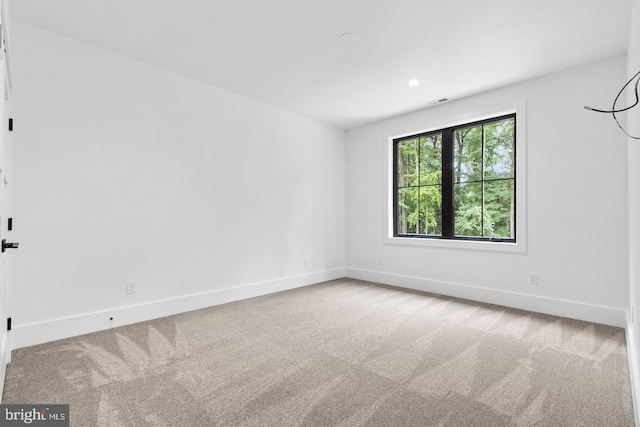 empty room with carpet floors