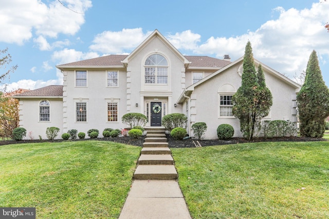 view of front of property with a front yard