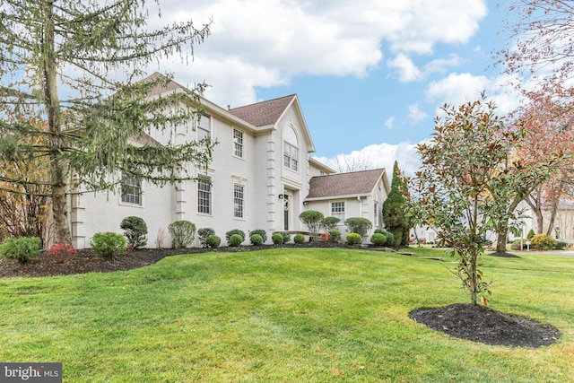 exterior space featuring a front lawn