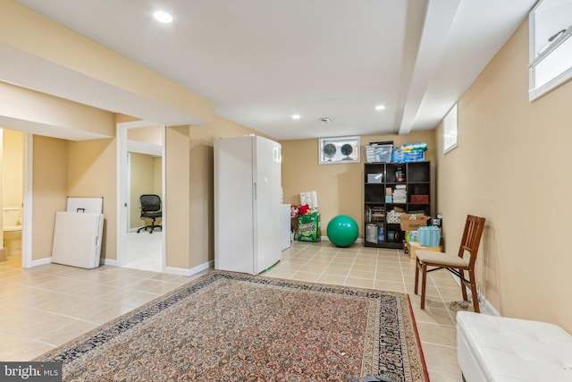 sitting room featuring light tile patterned floors