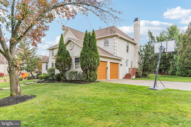 view of home's exterior with a yard and a garage