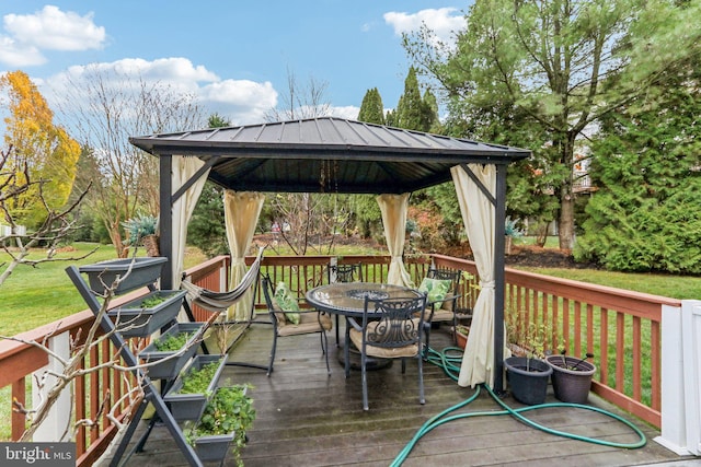 wooden terrace with a gazebo