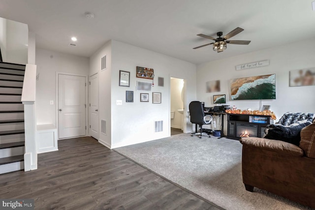 office area featuring ceiling fan and dark hardwood / wood-style flooring