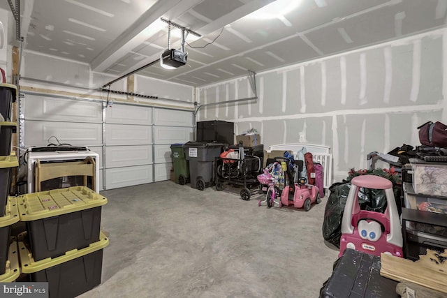 garage featuring a garage door opener