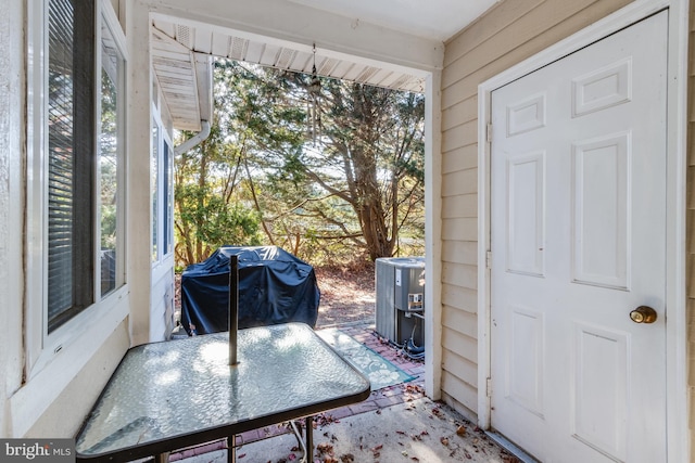 view of patio with central AC unit and grilling area