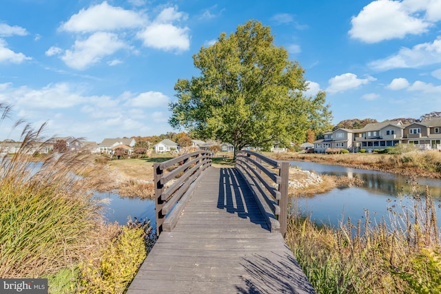 dock area featuring a water view