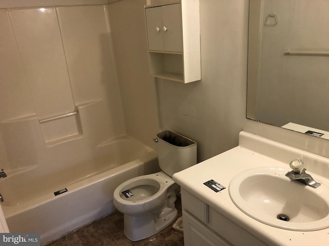 full bathroom featuring vanity, washtub / shower combination, and toilet