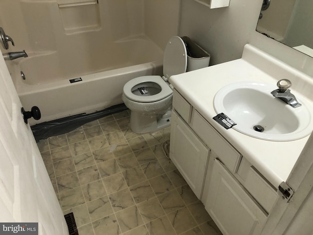 full bathroom with tile patterned floors, vanity, toilet, and tub / shower combination