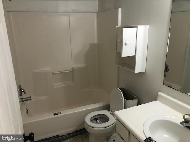 full bathroom with tile patterned flooring, shower / tub combination, vanity, and toilet