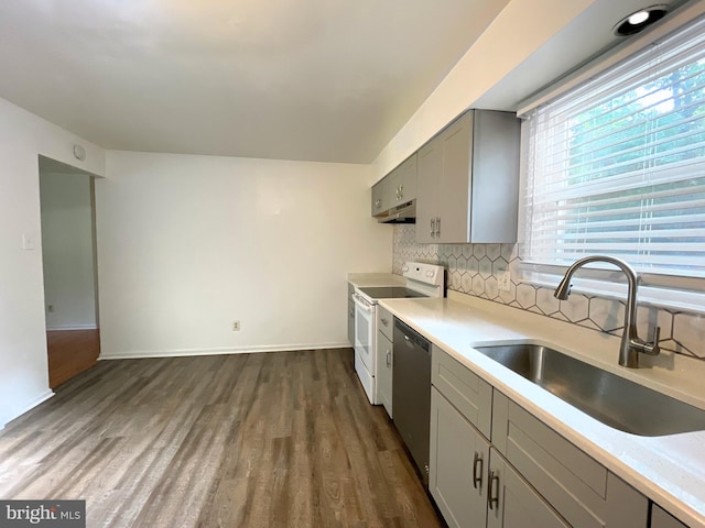 kitchen with gray cabinetry, sink, white electric range oven, stainless steel dishwasher, and dark hardwood / wood-style floors