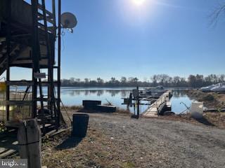 dock area with a water view