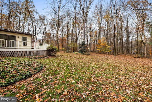 view of yard with a deck