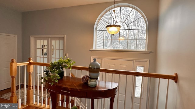 entryway with hardwood / wood-style flooring