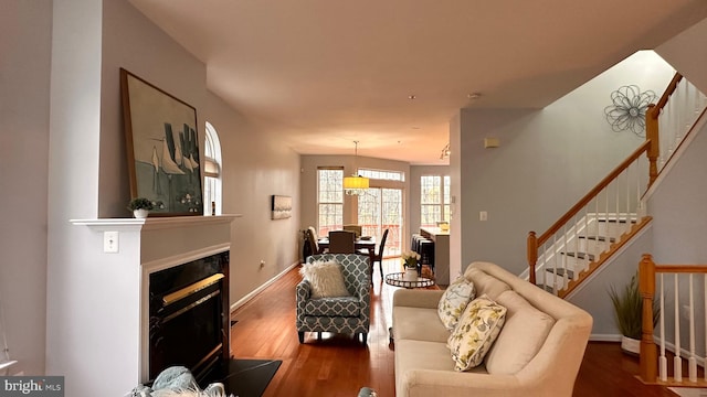 living room with dark wood-type flooring