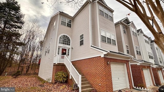 view of building exterior featuring a garage