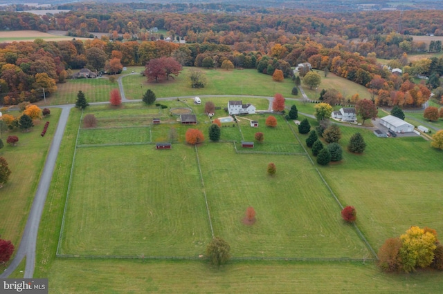 birds eye view of property featuring a rural view