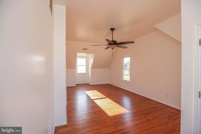 bonus room with ceiling fan, lofted ceiling, and hardwood / wood-style flooring