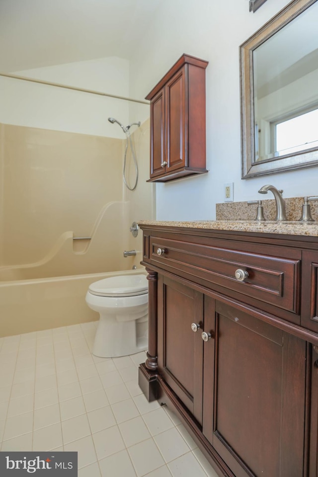 full bathroom with tile patterned flooring, shower / tub combination, vanity, and toilet