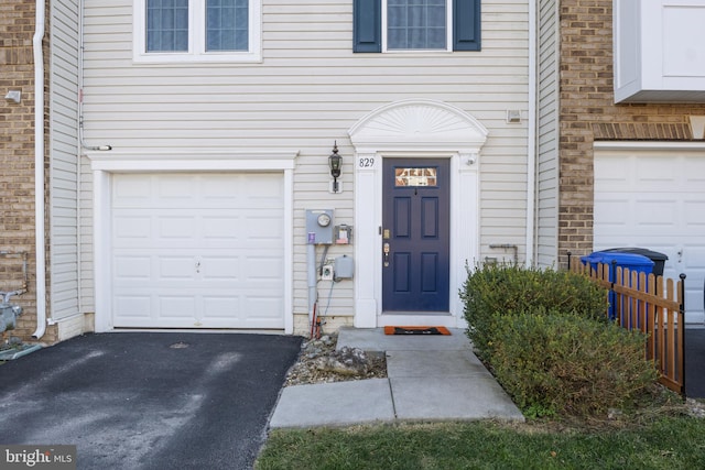 property entrance with a garage