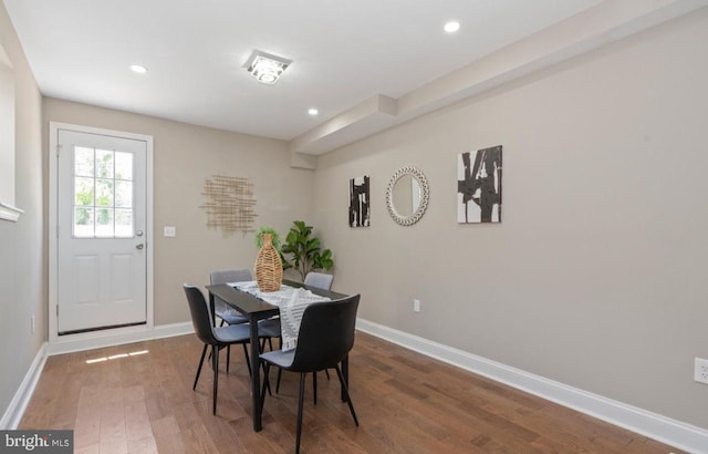 dining area with wood-type flooring