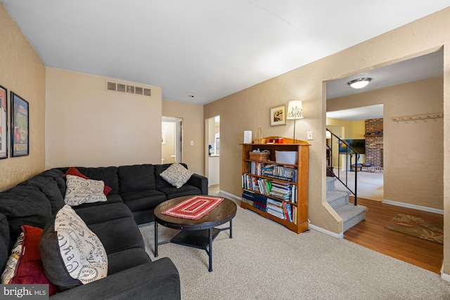 living room featuring carpet flooring