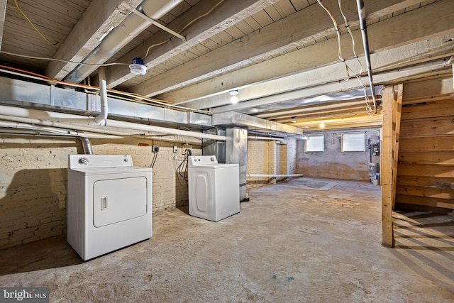 basement featuring washing machine and dryer