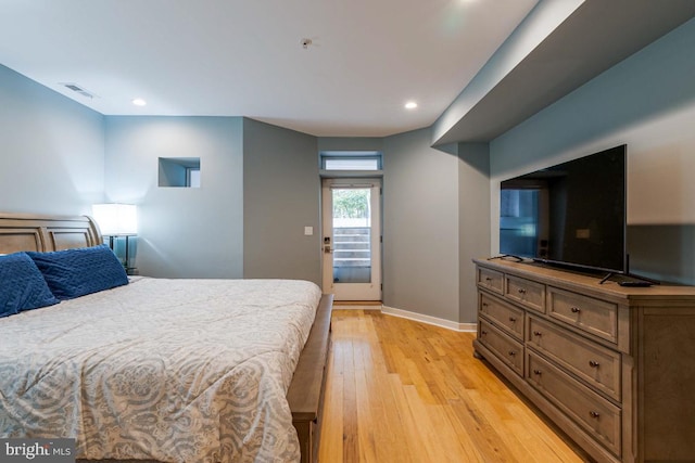 bedroom with light hardwood / wood-style flooring