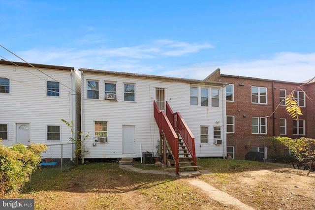 view of front of property featuring cooling unit